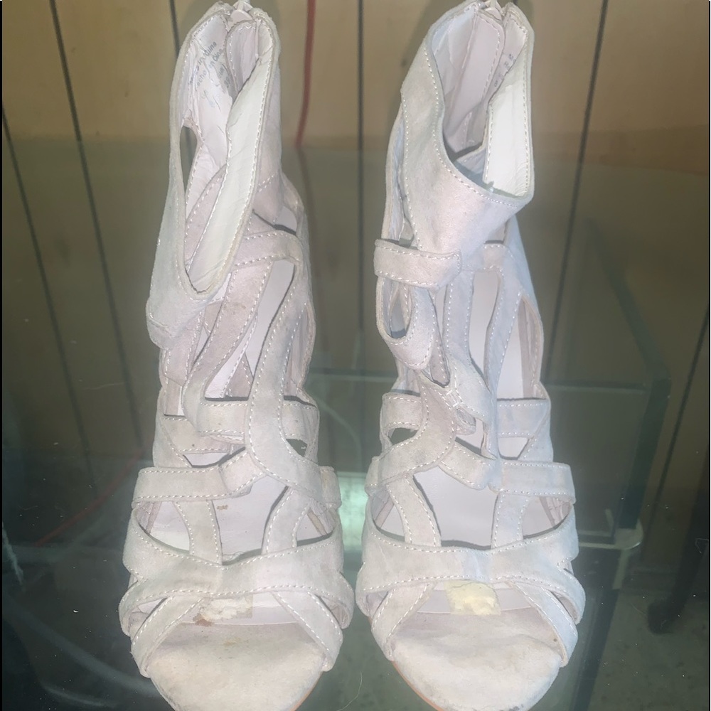 Woman’s shoes ALDO heels size 8.5 that come up around the ankle